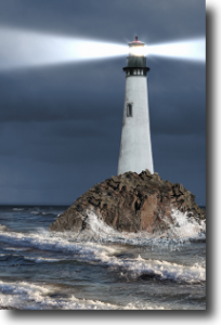 Light house on a rock at sea